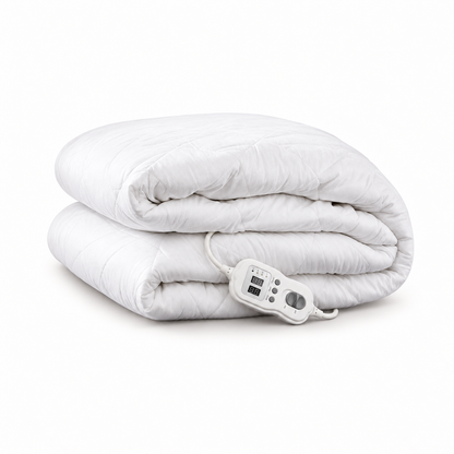 Folded white quilted electric blanket with controller on a white background