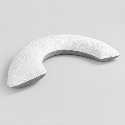 White and grey Somvane U-shaped body pillow on a plain background.