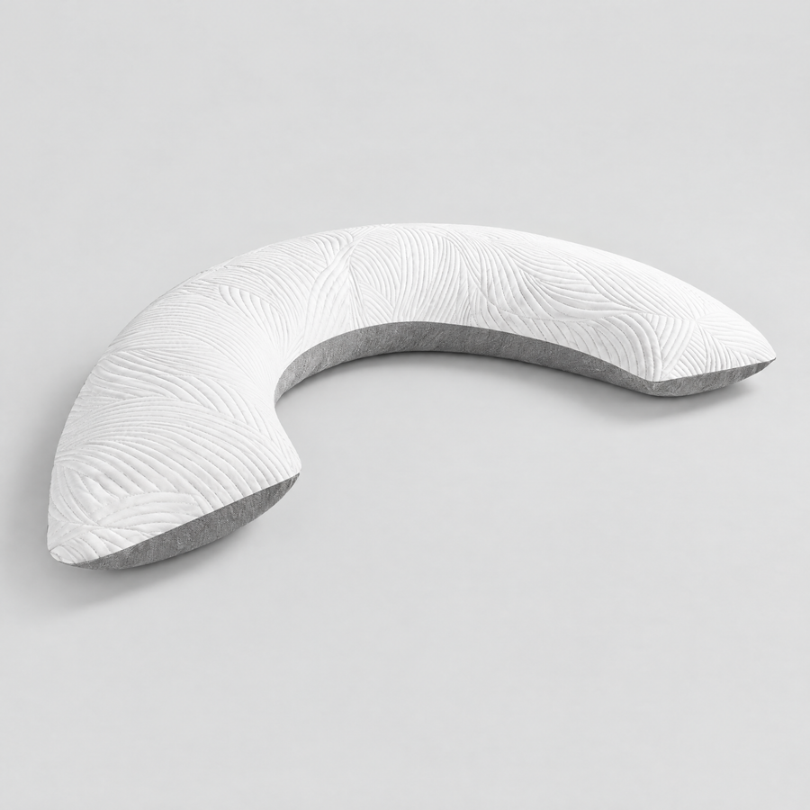 White and grey Somvane U-shaped body pillow on a plain background.